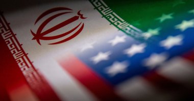 Iranian and U.S. flags are seen printed on paper in this illustration taken on Jan. 27, 2022. (Reuters Photo)