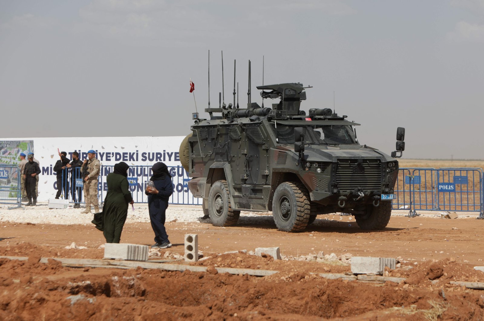 A Turkish military vehicle is seen during the inauguration of a Turkish-funded housing complex for the internally displaced, in Ghandoura, in the countryside of Jarablus district near the Turkish border, northern Syria, May 24, 2023. (AFP Photo)