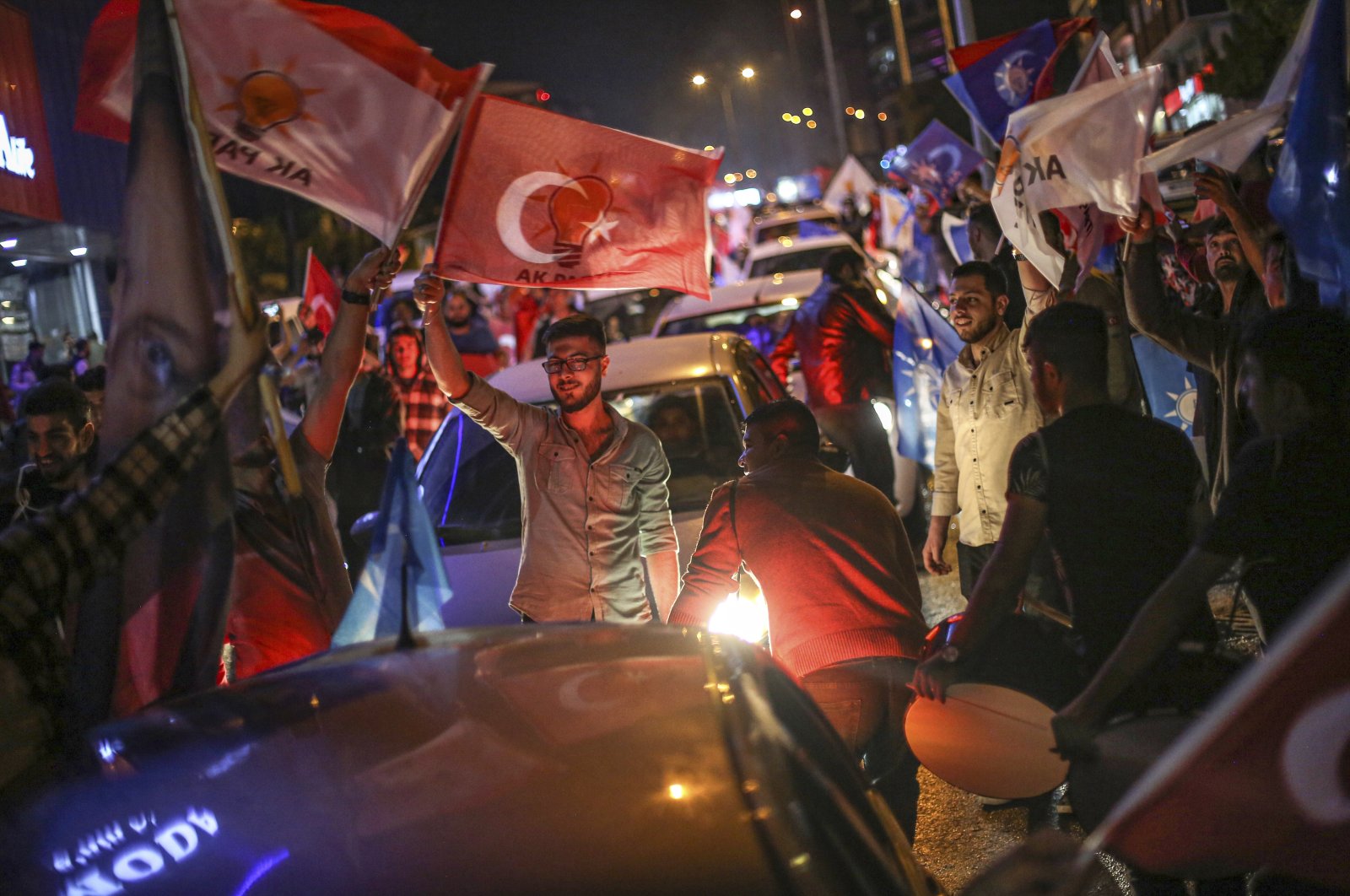 Supporters of President Recep Tayyip Erdoğan celebrate his runoff victory in Kahramanmaraş, southern Türkiye, May 28, 2023. (AP Photo)