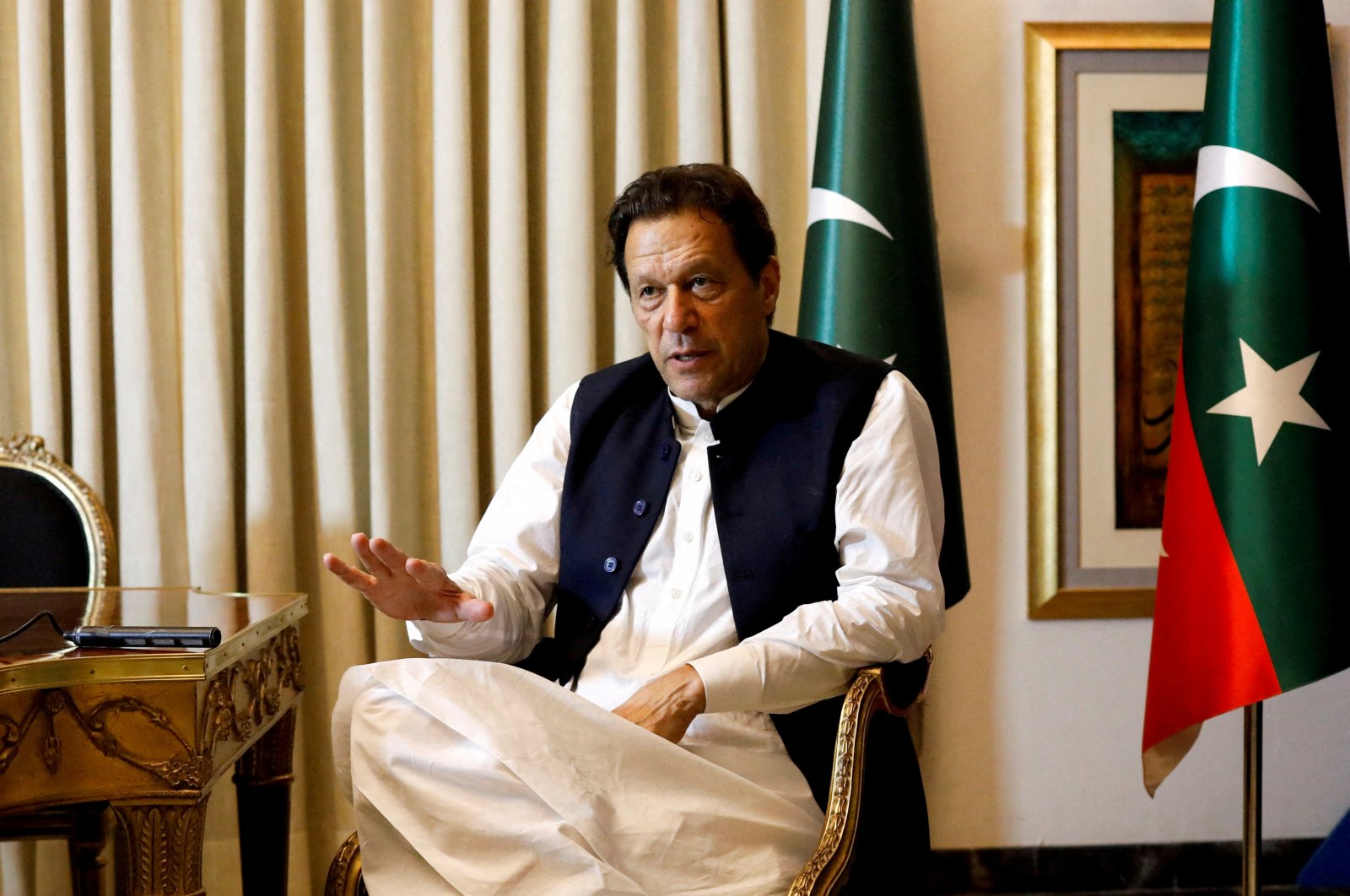 Former Pakistani Prime Minister Imran Khan speaks with Reuters during an interview, Lahore, Pakistan, March 17, 2023. (Reuters File Photo)
