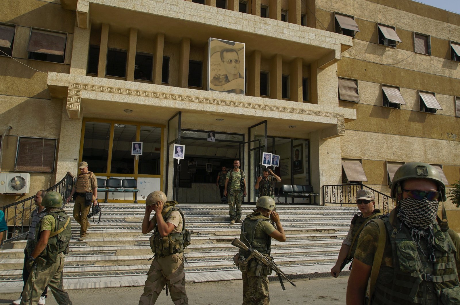 Russian military police soldiers walk outside a hospital in Deir el-Zour, Syria, Sept. 15, 2017. (AP File Photo)