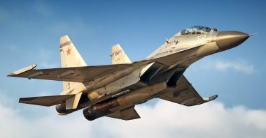 Twin engine Sukhoi Su-30 Flanker fighter bomber warplane flying over Moscow, Russia, August 2013. (Shutterstock File Photo)