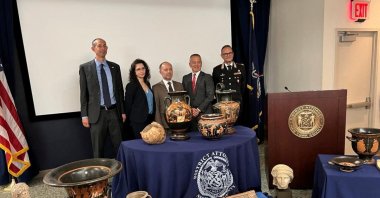 (L-R) Deputy Special Agent in Charge at Homeland Security Investigation NY, Mike Alfonso, First Legal Secretary of Manhattan District Attorney's Office, Gloria Garcia, Italy's Console added, Cesare Bieller, Assistant District Attorney NY, Col. Matthew Bogdanos, Commander of Carabinieri TPC General Vincenzo Molinese, present some of the antiquities returned to Italy from the U.S. during a ceremony in New York, U.S., Aug. 8, 2023. (Reuters Photo)