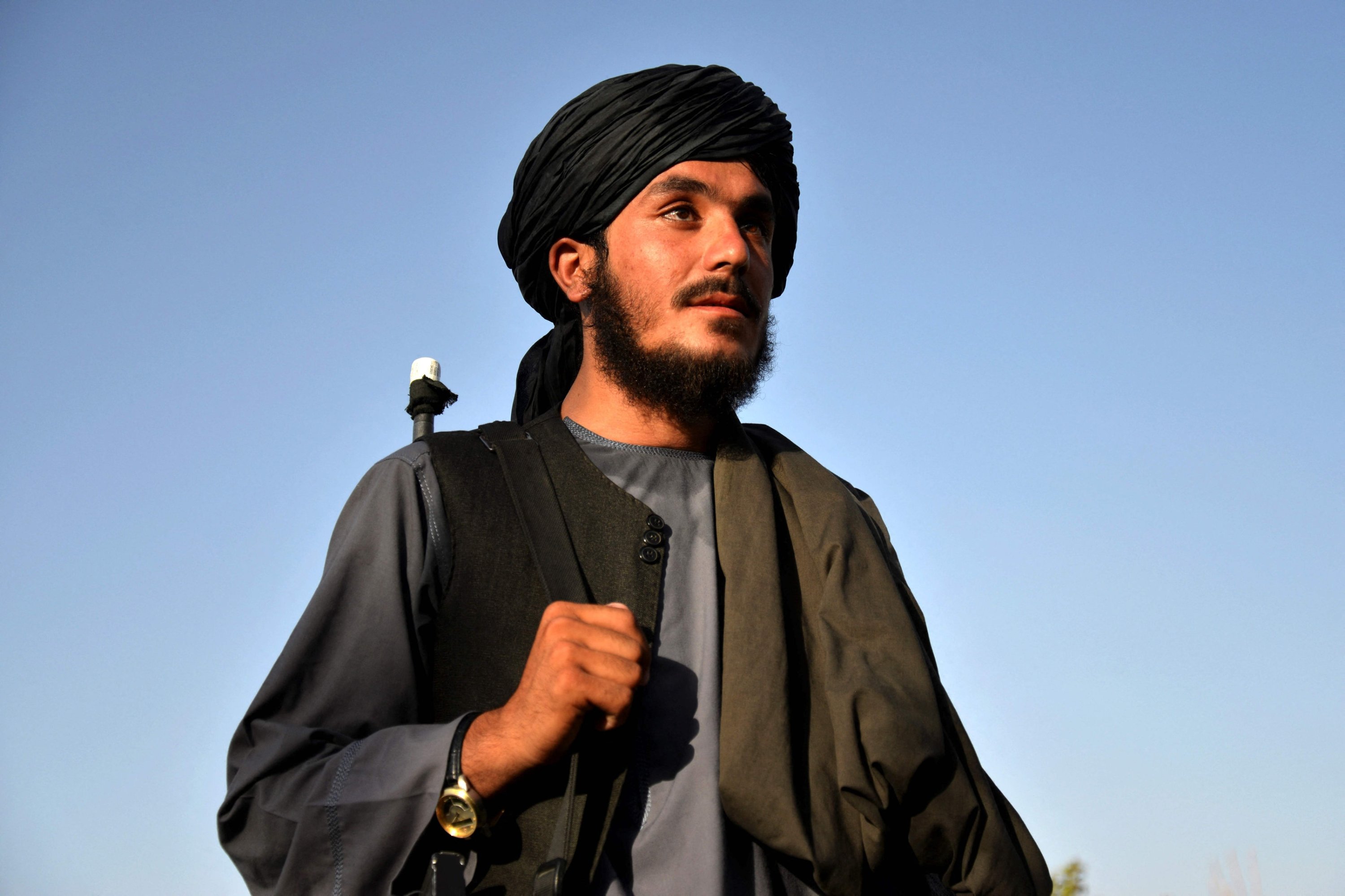 Taliban security personnel Lal Muhammad stands guard at the police headquarters in Dand district of Kandahar province, Afghanistan, Aug. 1, 2023. (AFP Photo)