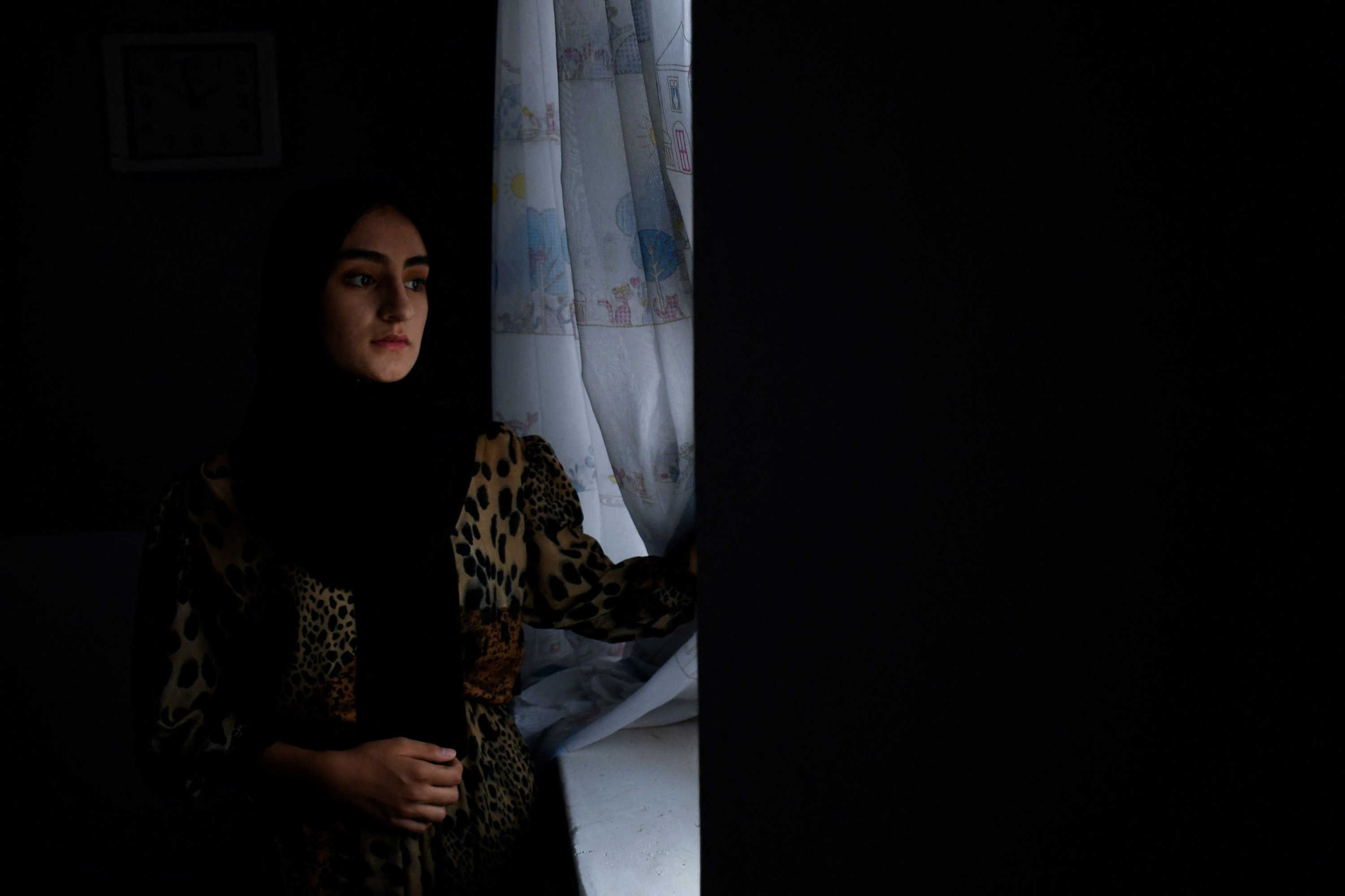 Hamasah Bawar, a medical student poses for a photograph at her house in Mazar-i-Sharif, Afghanistan, Aug. 6, 2023. (AFP Photo)