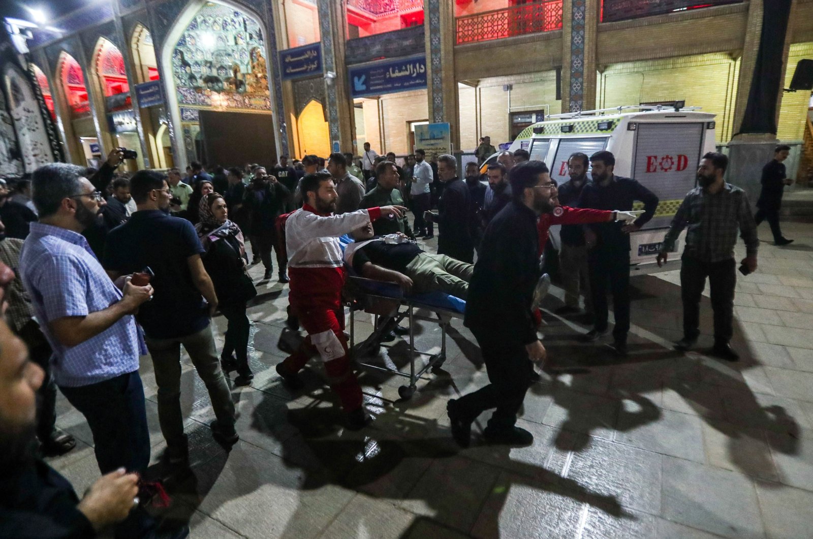 An injured person is carried away on a stretcher following a shooting at the Shah Cheragh shrine in Shiraz, Iran, Aug. 13, 2023. (EPA Photo)