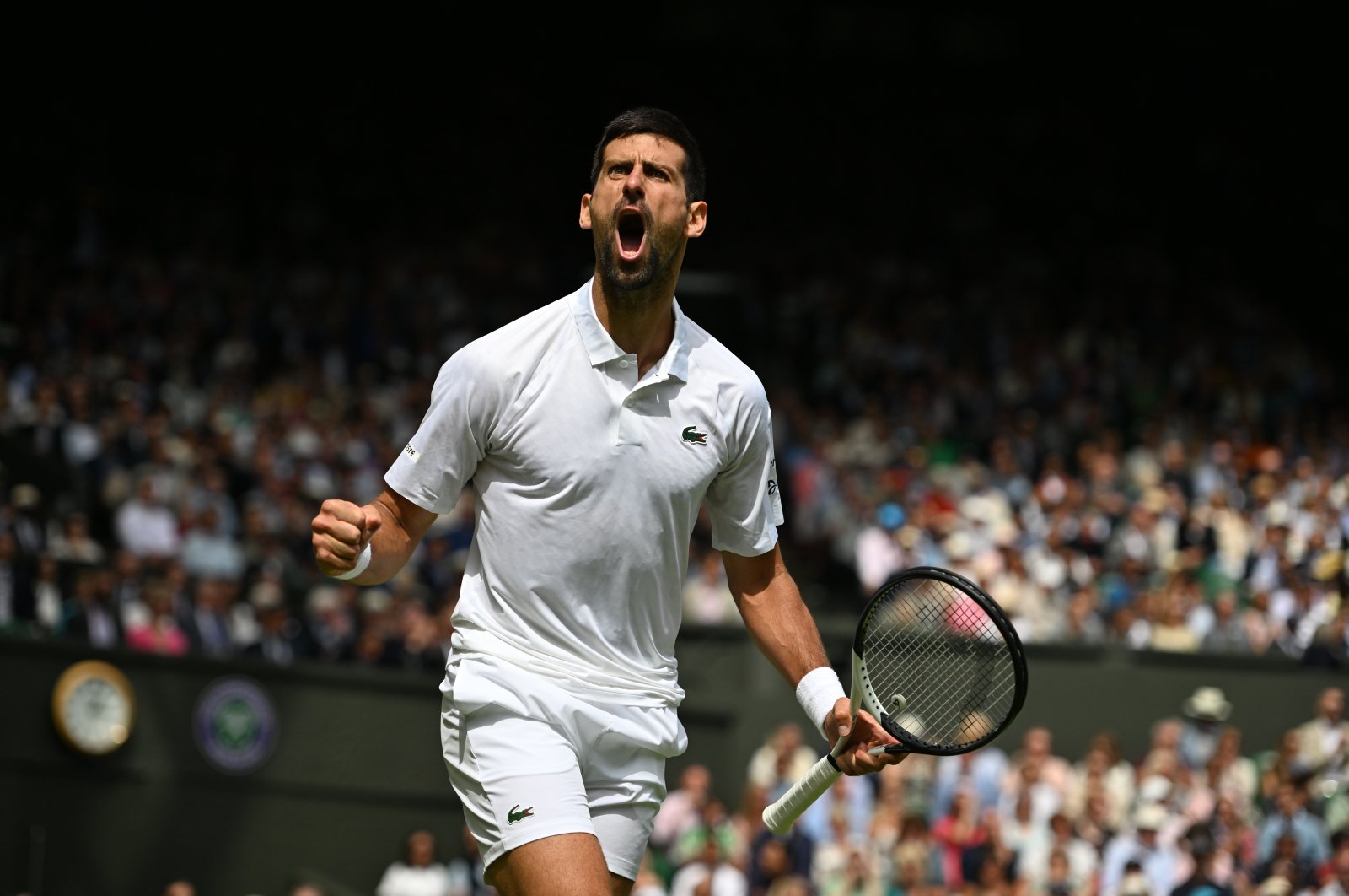 Novak Djokovic in action against Carlos Alcaraz during the Wimbledon final match, London, U.K., July 16, 2023. (AA Photo)