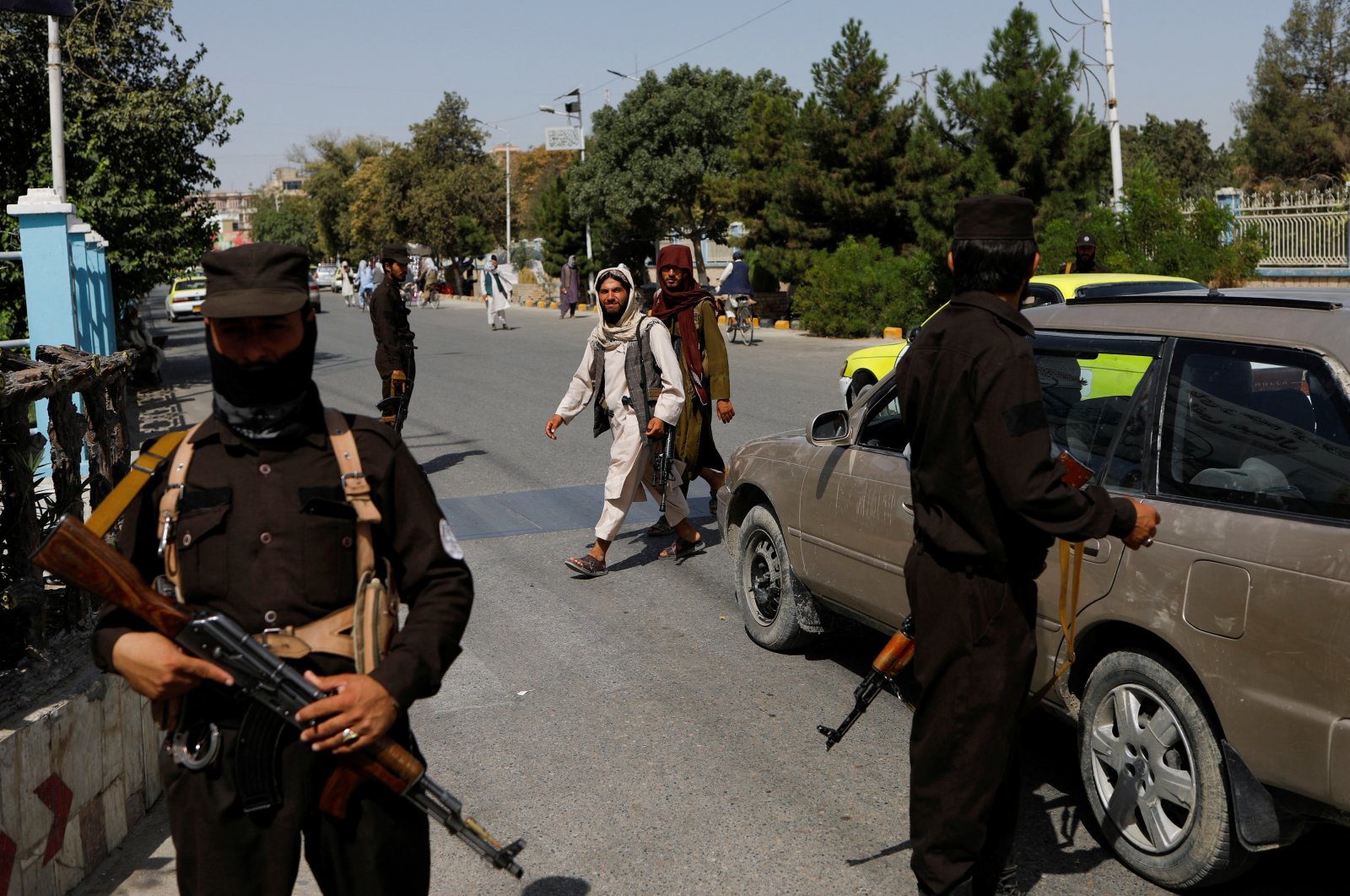 Taliban soldiers walk on a street in Mazar-i-Sharif, Afghanistan, Aug. 6, 2023. (Reuters Photo)