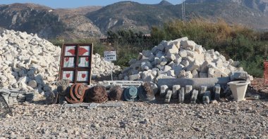 Artifacts are seen found from the debris in Antakya, Hatay, Türkiye, Aug. 15, 2023. (AA Photo)