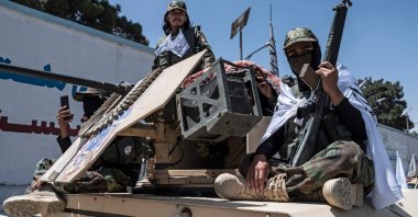 Taliban security personnel parade on a Humvee convoy in Kabul, Afghanistan, Aug. 15, 2023. (AFP Photo)