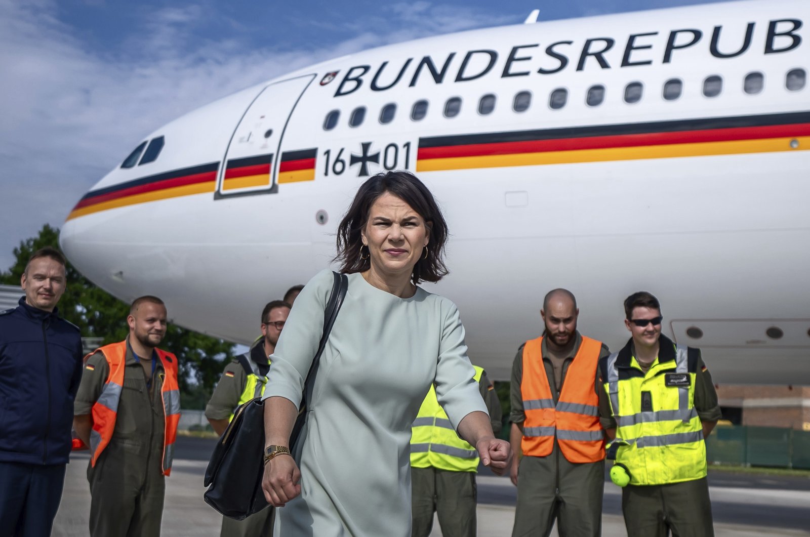 Germany&#039;s Foreign Minister Annalena Baerbock walks through the airport of the airbase after her arrival from New York, in Bonn, Germany, July 18, 2023. (AP Photo)