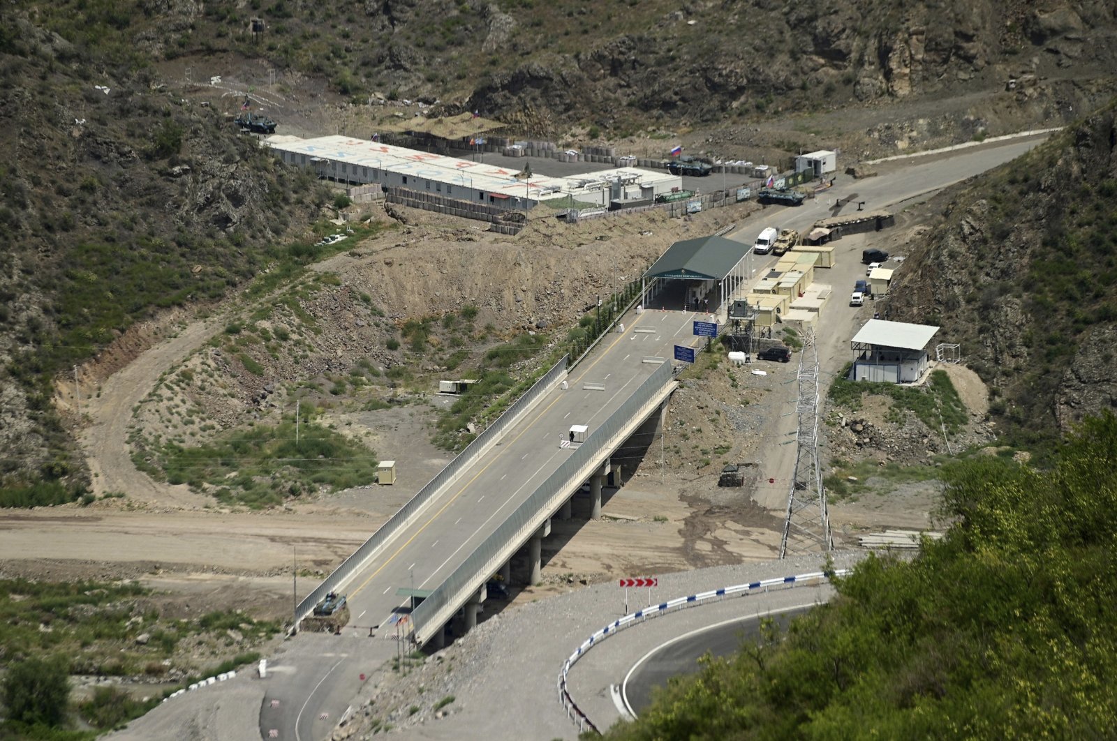 A bridge and a checkpoint are seen on a road towards the separatist region of Nagorno-Karabakh, in Armenia, Friday, July 28, 2023. (AP File Photo)