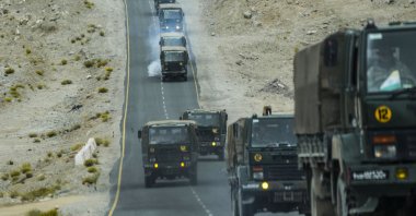Indian army vehicles move in a convoy in Ladakh, India, Sept. 20, 2022. (AP Photo)