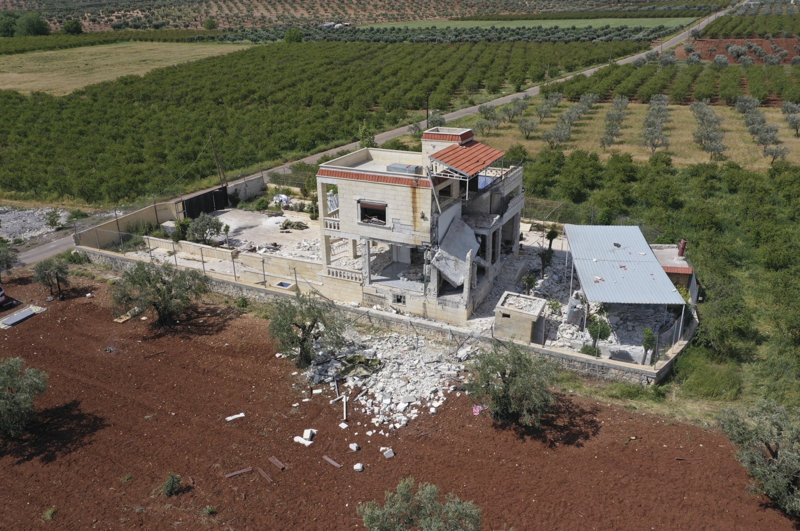 An aerial view of the house located north of the town of Aleppo, Syria where a Daesh leader, code-named Abu Hussein al-Qurayshi, was killed by the National Intelligence Organization (MIT), May 1, 2023. (AP Photo)