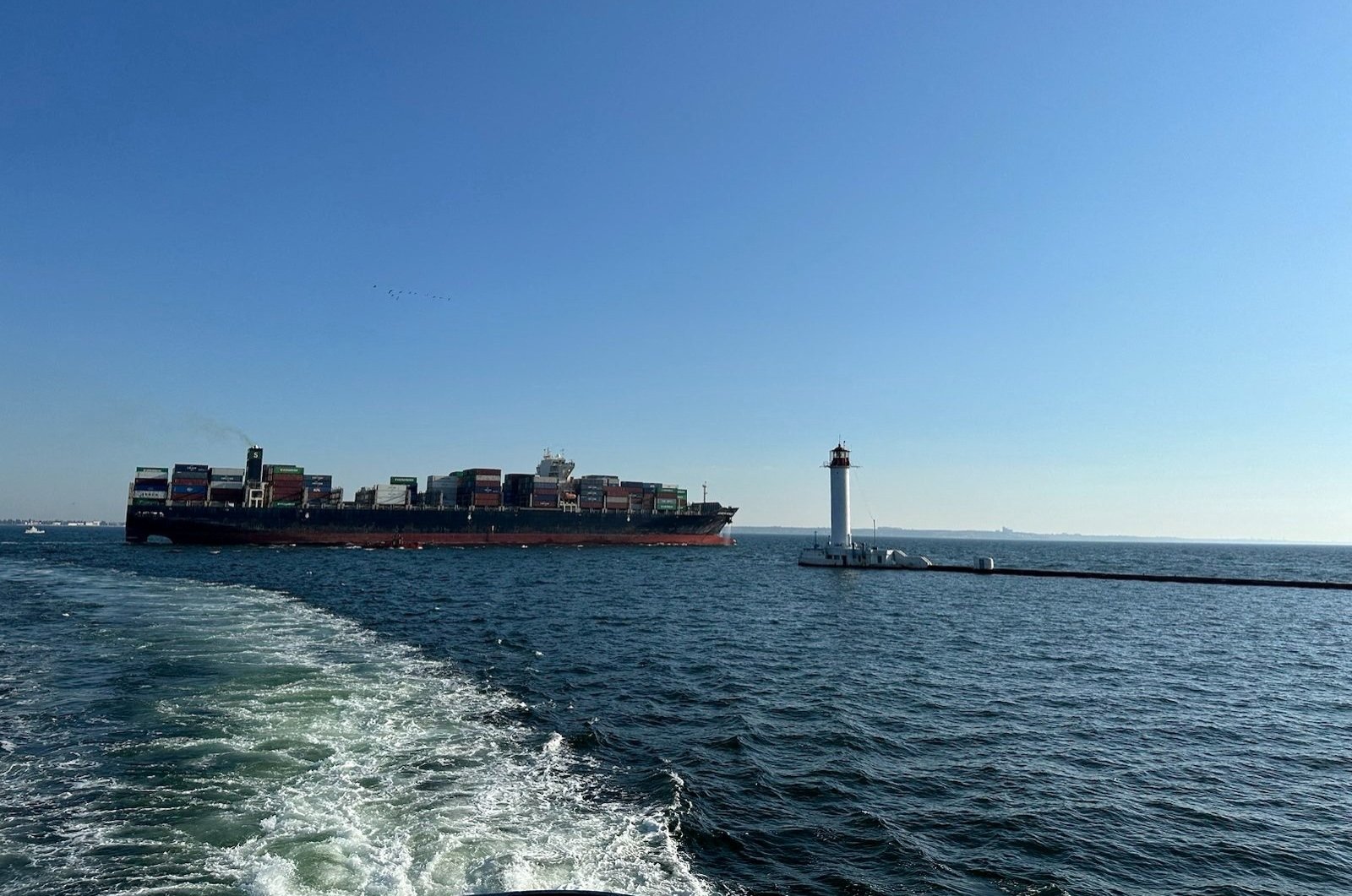 Ukraine tries out new Black Sea route as Russia pounds grain depots
