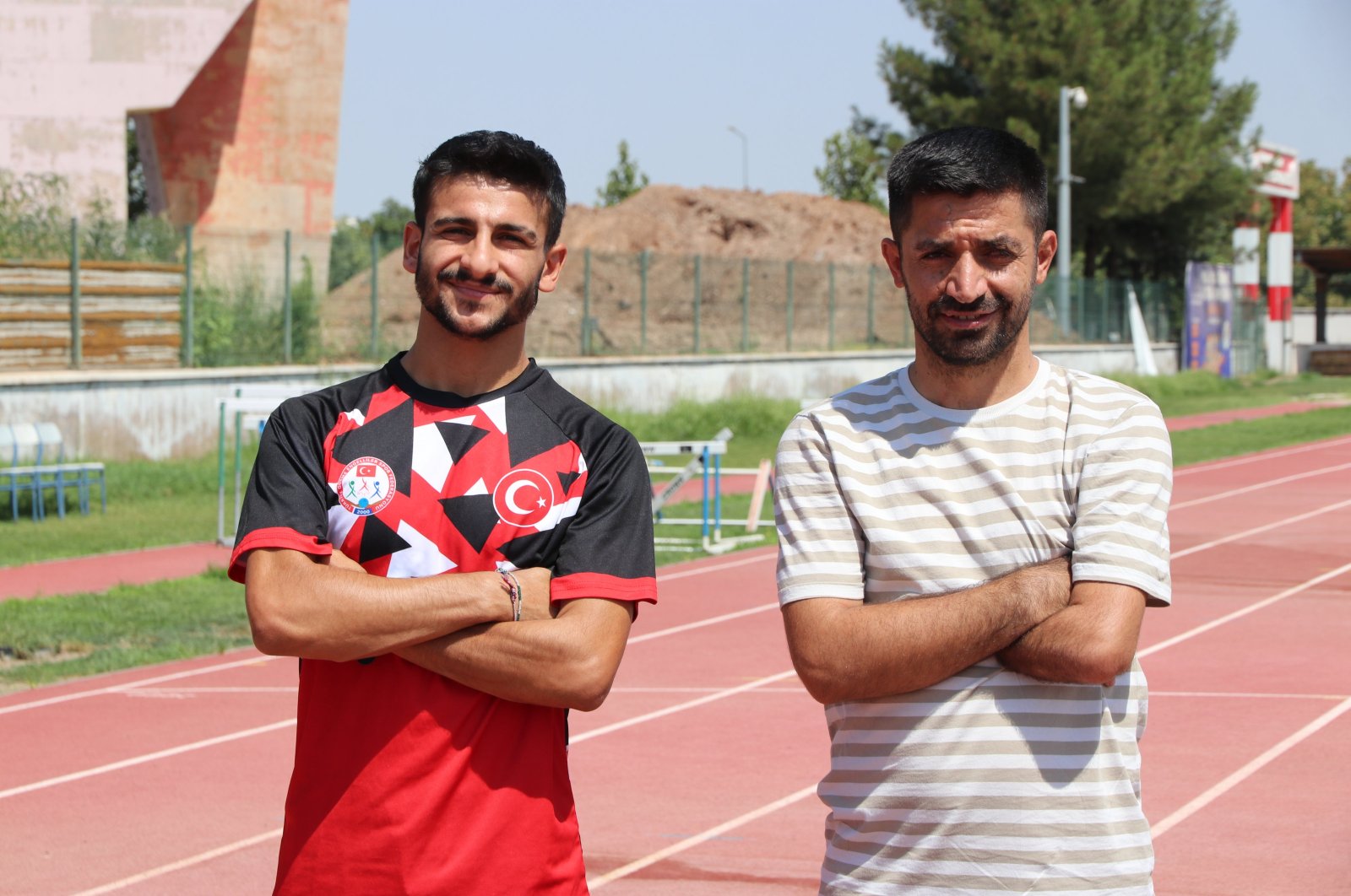 Şırnak&#039;s athlete Mikail Al (R) poses for a photo after training for the 2024 Paris Paralympic Games, Şırnak, Türkiye, Aug. 11, 2023. (AA Photo)