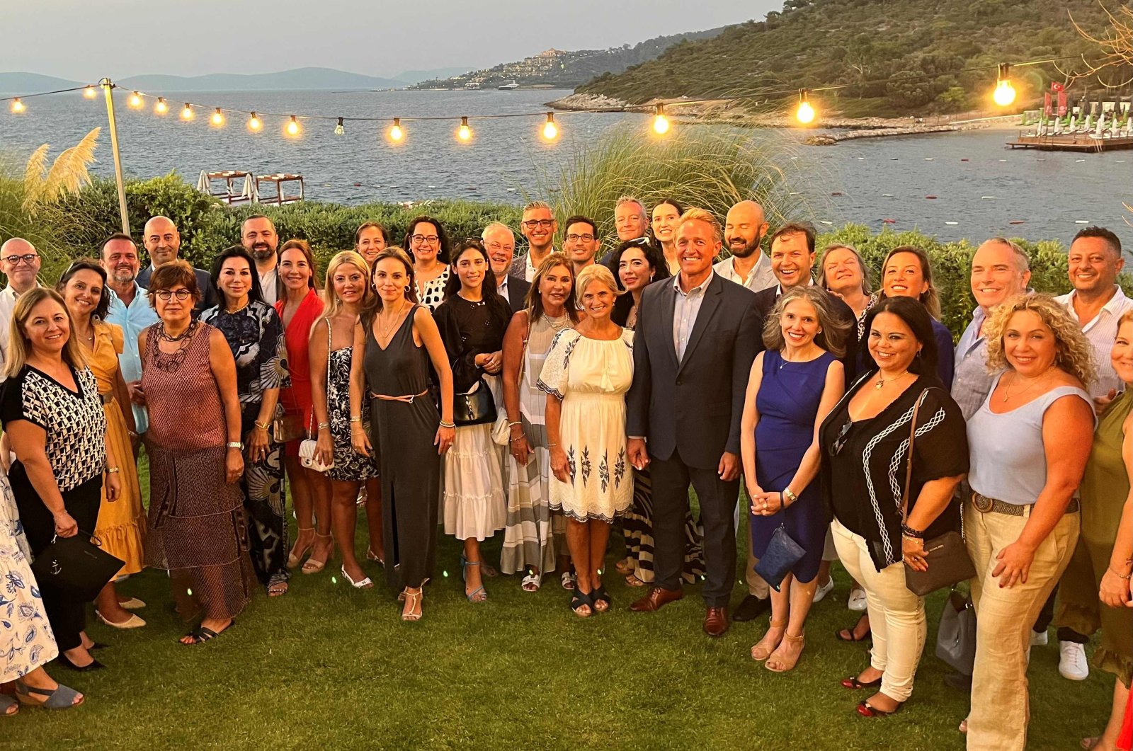 U.S. Ambassador to Ankara Jeffry Flake (5th from R) and executives of AmCham Türkiye member companies pose for a photo in Bodrum, Muğla province, southern Türkiye, provided on Aug. 16, 2023. (Courtesy of AmCham Türkiye)