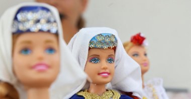 Dolls are displayed dressed in Bosnia's traditional folklore costumes made by 11-year-old Bosnian girl Esma Gljiva, who hopes that her folklore Barbie will reach many, as the frenzy surrounding the launch of the "Barbie" movie spreads across the world, Sarajevo, Bosnia and Herzegovina, Aug. 15, 2023. (Reuters Photo)