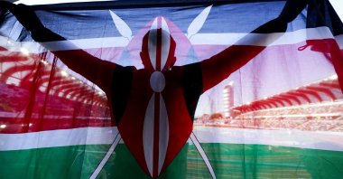 A fan of Kenya holds up a national flag during the final in the women&#039;s 5,000-meter run at the World Athletics Championships, Oregon, U.S., July 23, 2022. (AP Photo)