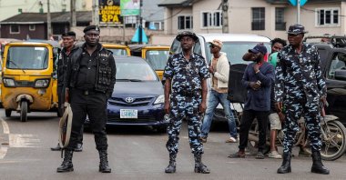 Security forces members stand guard during nationwide protests over the removal of fuel subsidies in Lagos, Nigeria, Aug. 2, 2023. (EPA Photo)