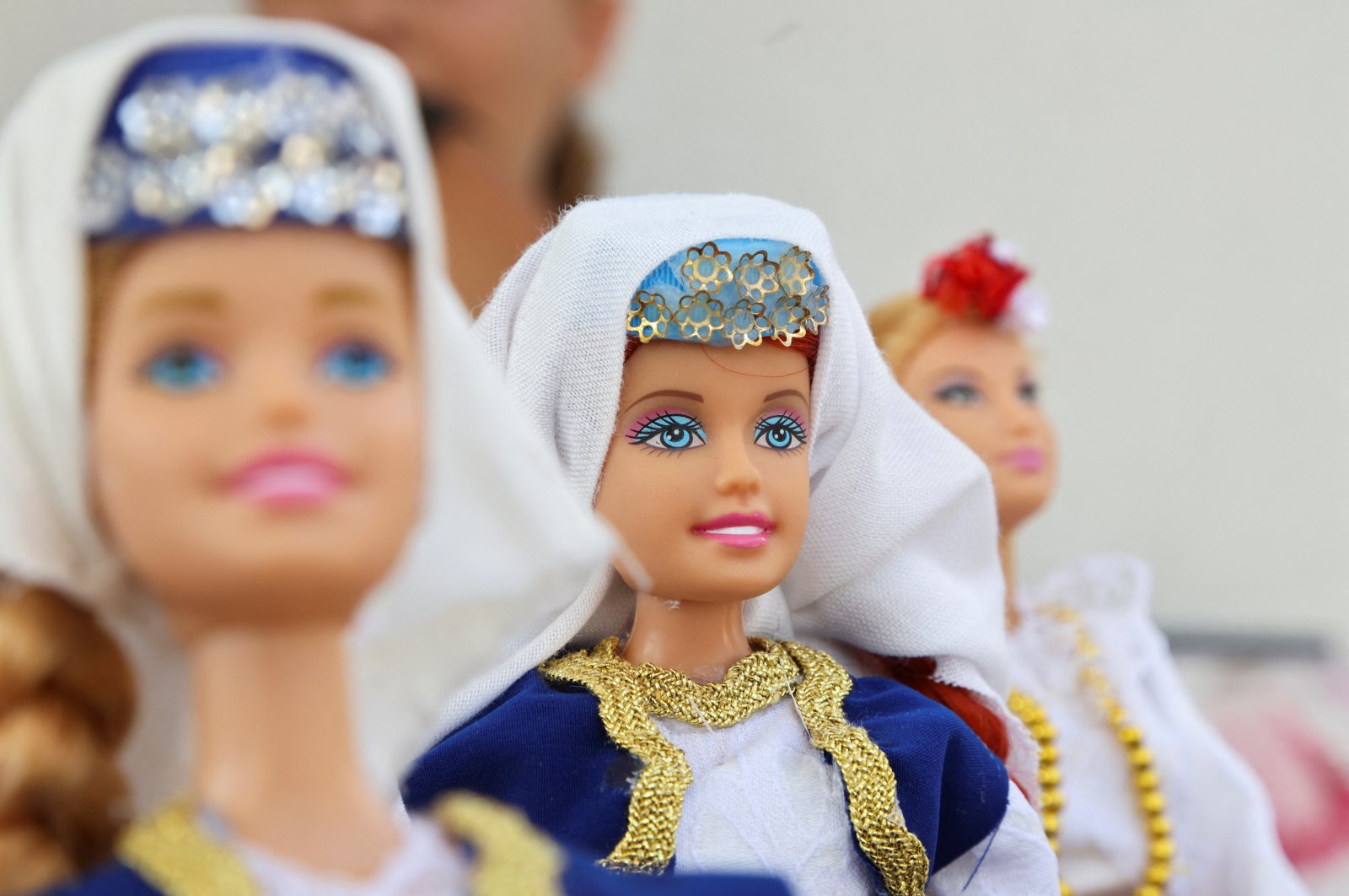 Dolls are displayed dressed in Bosnia&#039;s traditional folklore costumes made by 11-year-old Bosnian girl Esma Gljiva, who hopes that her folklore Barbie will reach many, as the frenzy surrounding the launch of the &quot;Barbie&quot; movie spreads across the world, Sarajevo, Bosnia and Herzegovina, Aug. 15, 2023. (Reuters Photo)