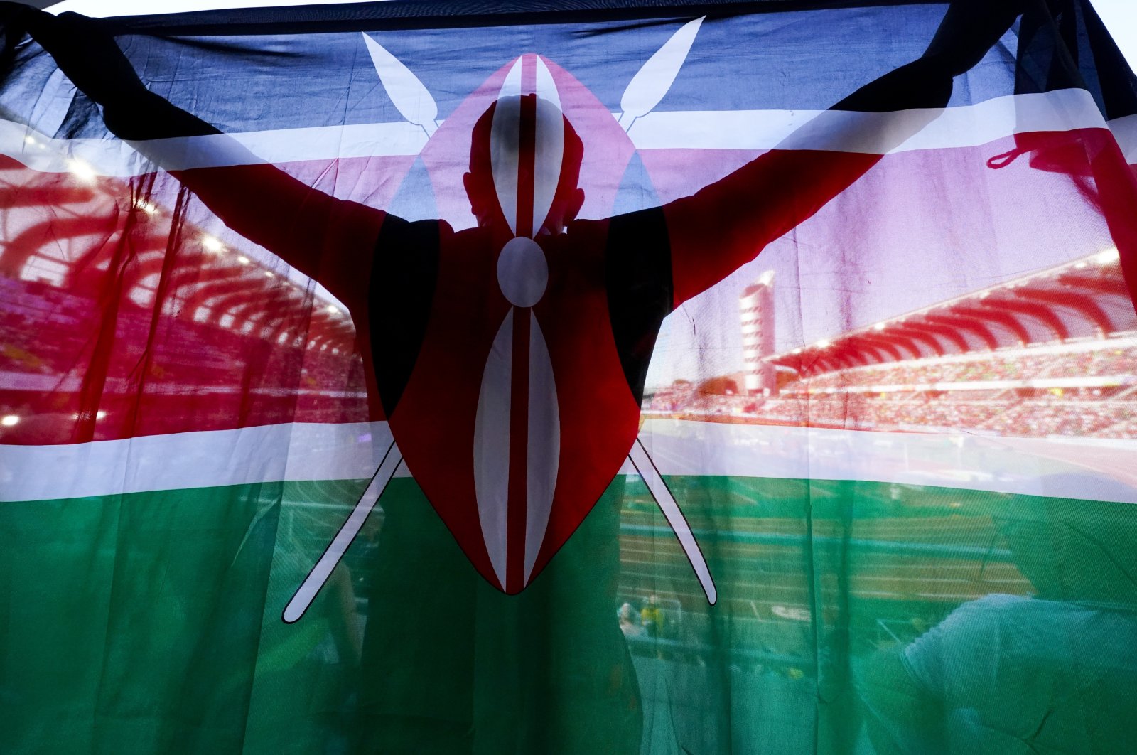 A fan of Kenya holds up a national flag during the final in the women&#039;s 5,000-meter run at the World Athletics Championships, Oregon, U.S., July 23, 2022. (AP Photo)