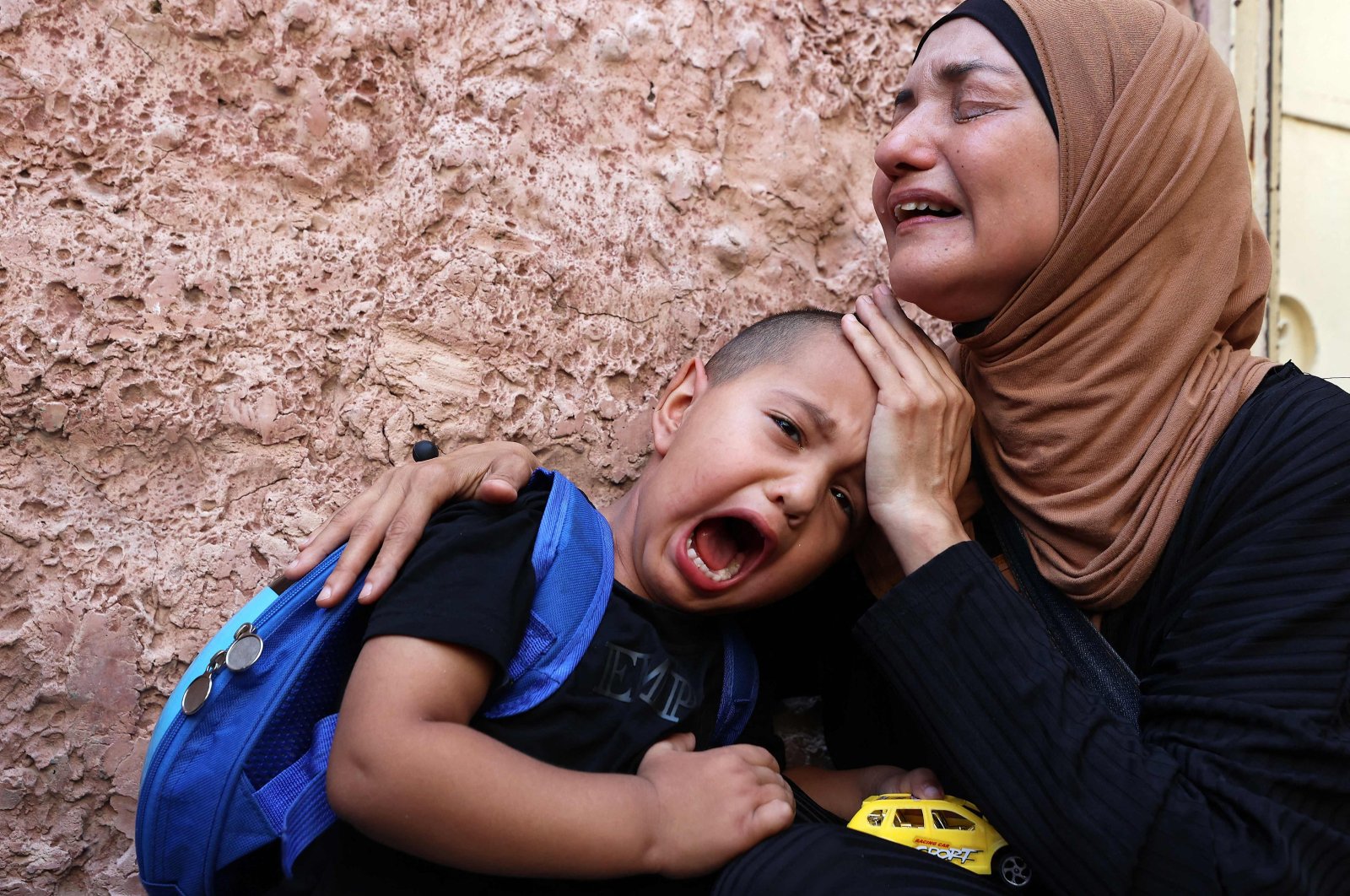 Family members cry during the funeral of a Palestinian man killed in an Israeli military raid in the occupied West Bank, Palestine, Aug. 17, 2023. (AFP Photo)
