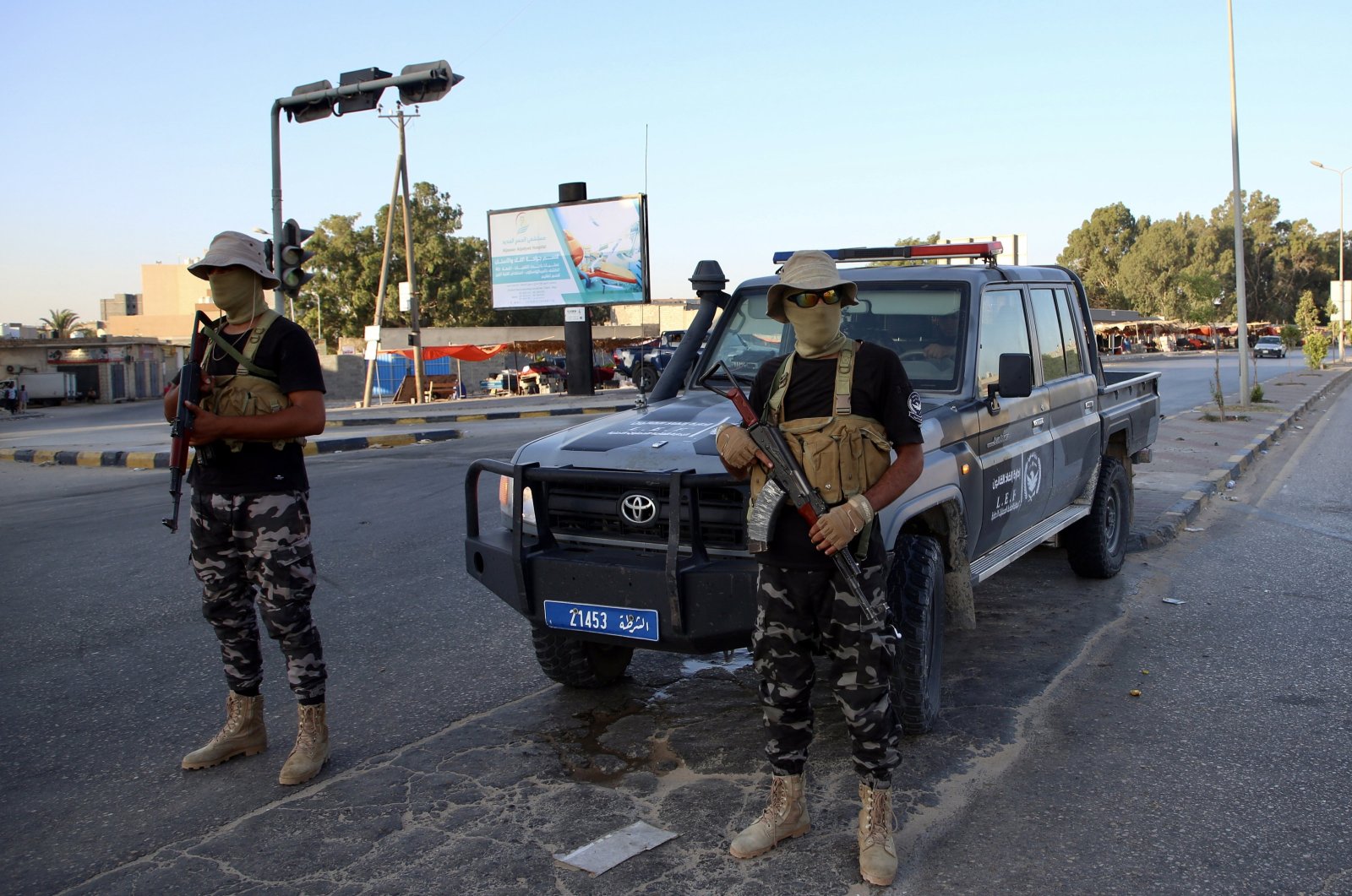 Forces affiliated with the Tripoli-based Government of National Unity (GNU) secure a street in Tripoli, Libya, Aug. 16, 2023. (EPA Photo)