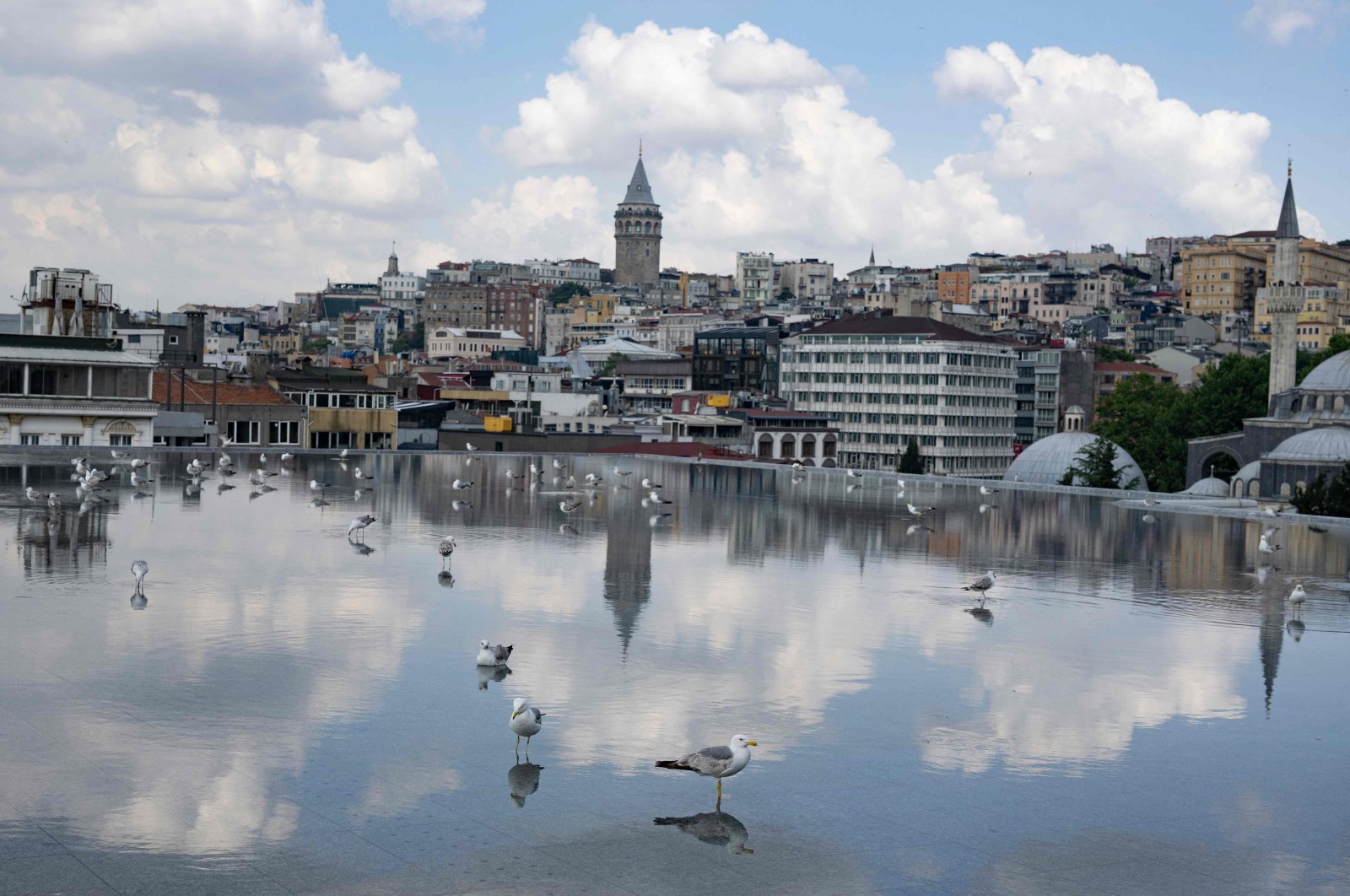 The exterior of the new building of the Istanbul Modern Art Museum looking towards the Galata Tower, in Istanbul, Türkiye, June 20, 2023. (AFP Photo)