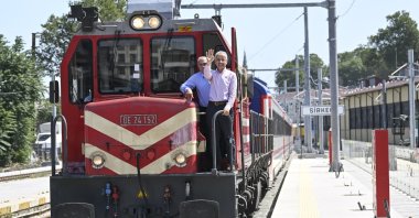 Transportation and Infrastructure Minister Abdulkadir Uraloğlu waves during the test drive on the Sirkeci-Kazlıçeşme railway route, Istanbul, Türkiye, Aug. 19, 2023. (AA Photo)