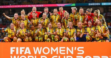 Sweden players celebrate with their bronze medals after winning the Australia and New Zealand 2023 Women's World Cup third place playoff football match between Sweden and Australia at Brisbane Stadium, Brisbane, Australia, Aug. 19, 2023. (AFP Photo)