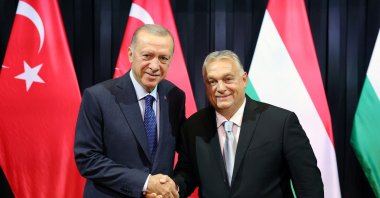 President Recep Tayyip Erdoğan (L) shakes hands with Hungarian Prime Minister Viktor Orban, in Budapest, Hungary, Aug. 20, 2023. (Reuters Photo)