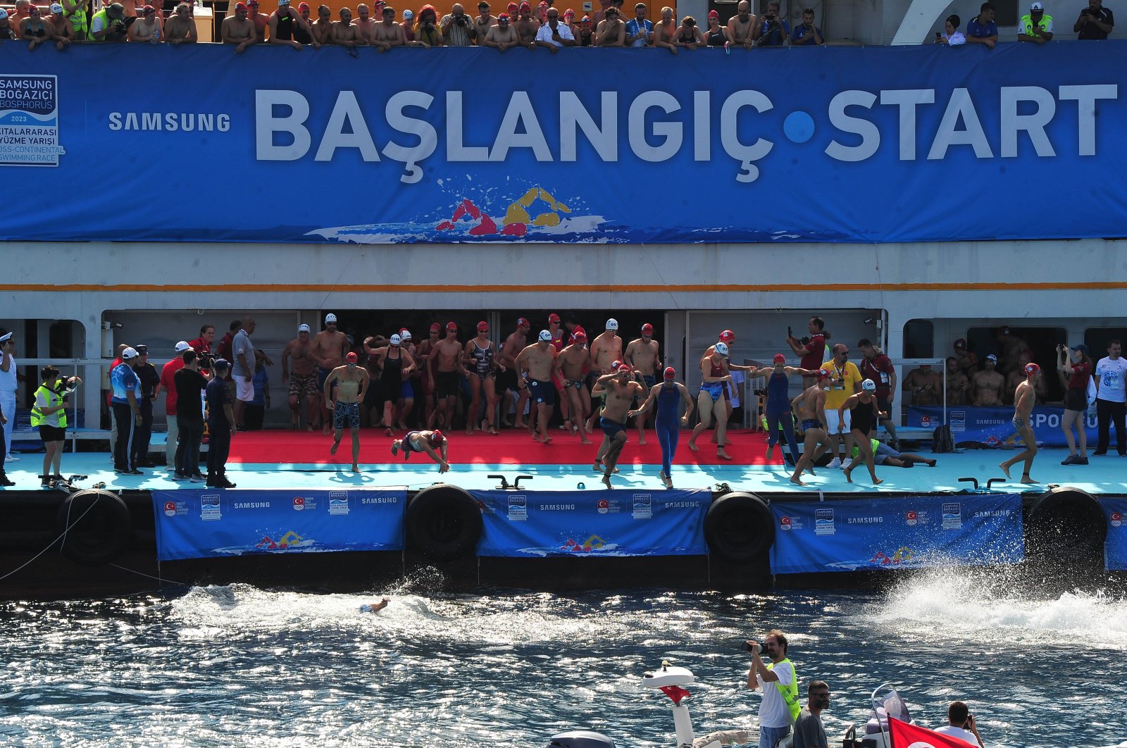 The 35th Edition of the Samsung Bosphorus Cross-Continental Swim Race participants in action, Istanbul, Türkiye, Aug. 20, 2023. (DHA Photo)