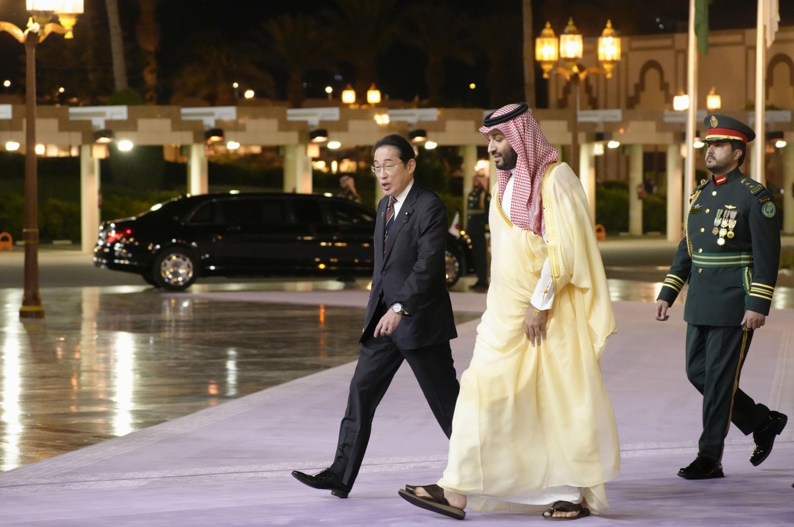 Japanese Prime Minister Fumio Kishida (L) and Saudi Arabian Crown Prince Mohammed bin Salman (C) are pictured before their talks in Jeddah, Saudi Arabia, July 16, 2023. (Reuters Photo)