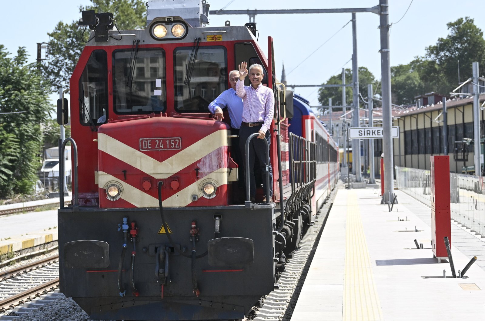 Transportation and Infrastructure Minister Abdulkadir Uraloğlu waves during the test drive on the Sirkeci-Kazlıçeşme railway route, Istanbul, Türkiye, Aug. 19, 2023. (AA Photo)