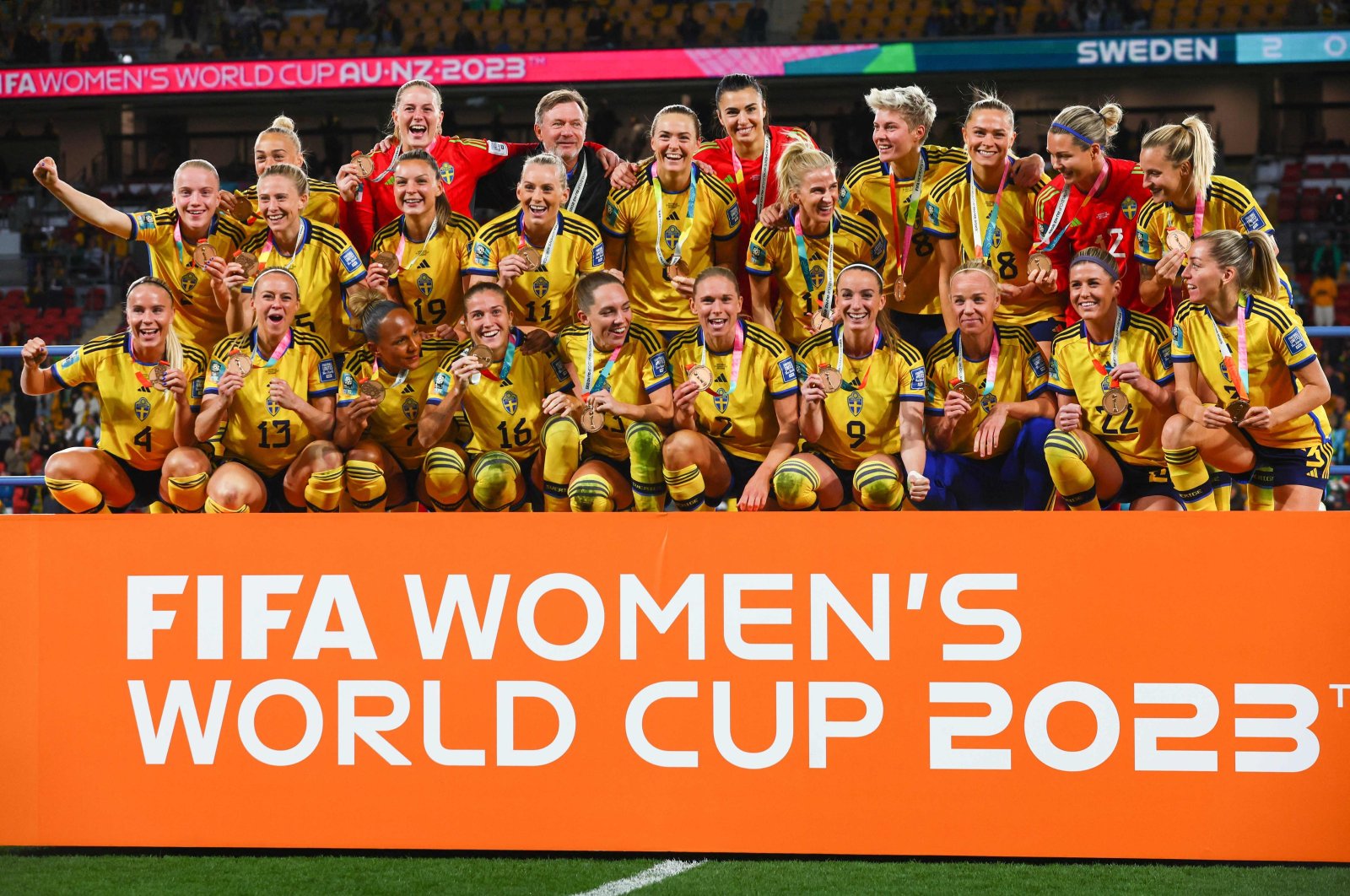 Sweden players celebrate with their bronze medals after winning the Australia and New Zealand 2023 Women&#039;s World Cup third place playoff football match between Sweden and Australia at Brisbane Stadium, Brisbane, Australia, Aug. 19, 2023. (AFP Photo)