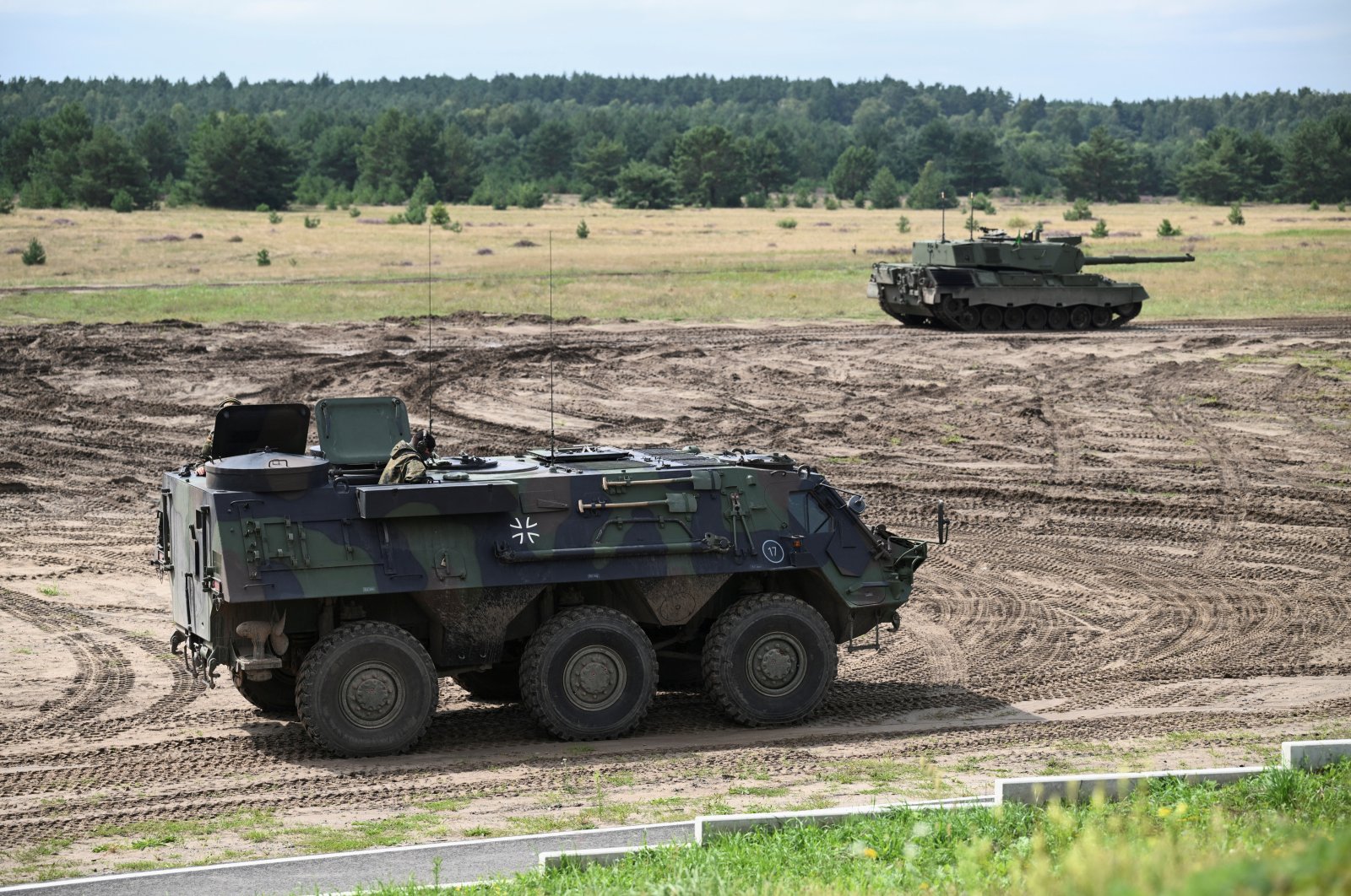 The TPz Fuchs armoured personnel carrier is seen as Ukrainian soldiers train to use a Leopard 1A5 main battle tank during a media day of the European Union Military Assistance Mission in support of Ukraine (EUMAM Ukraine) in Klietz, Germany, Aug. 17, 2023. (Reuters Photo)