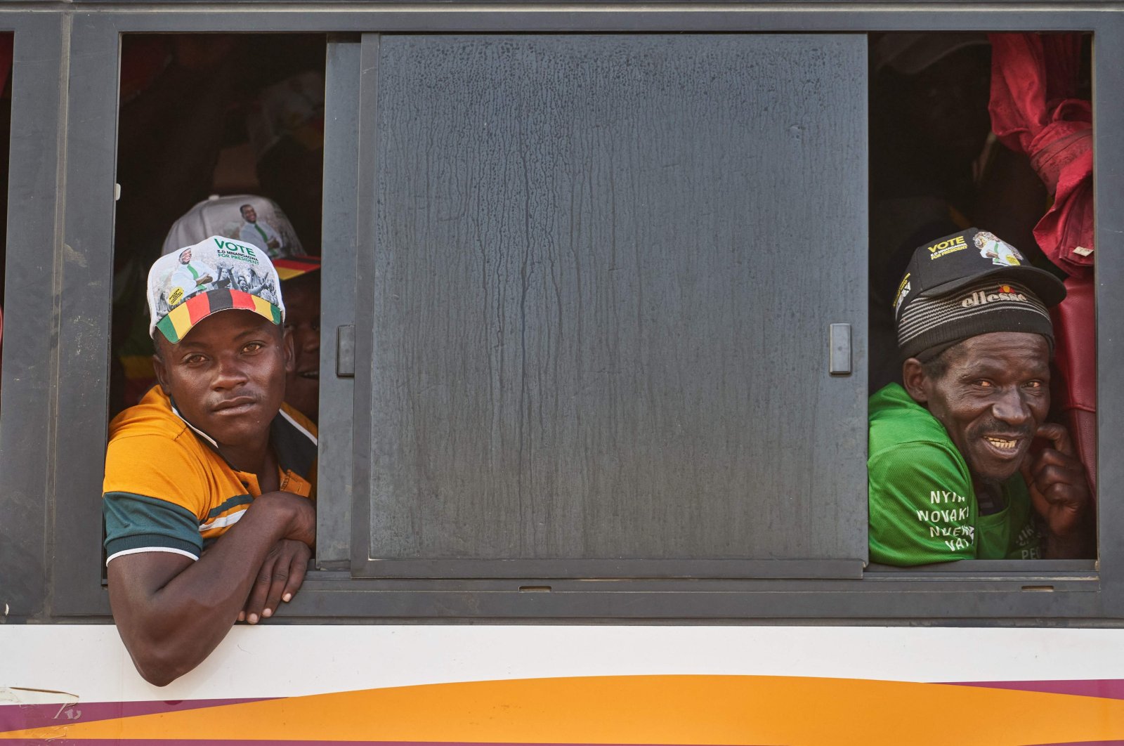 Supporters depart after a Zimbabwe African National Union meeting, Nkayi district, Zimbabwe, July 30, 2023. (AFP Photo)