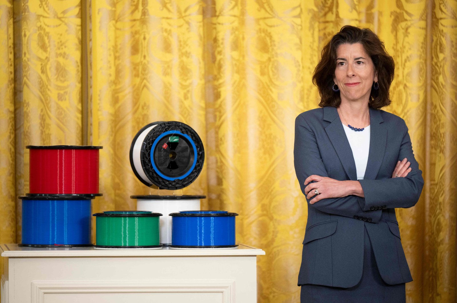 U.S. Secretary of Commerce Gina Raimondo looks on during a high-speed internet infrastructure announcement in the East Room of the White House in Washington, D.C., U.S., June 26, 2023. (AFP Photo)