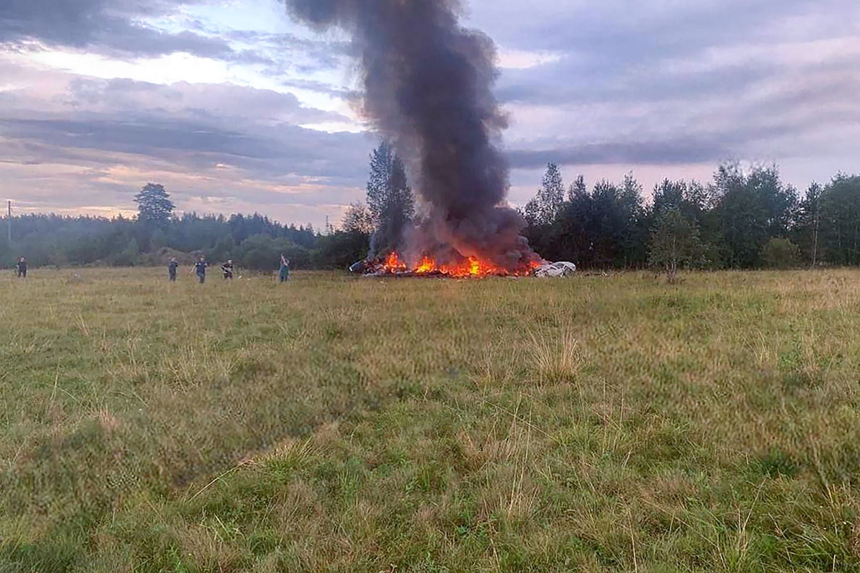 This photograph posted on a Wagner-linked Telegram channel shows a burning plane wreckage near the village of Kuzhenkino, Tver region, Russia, Aug. 23, 2023.