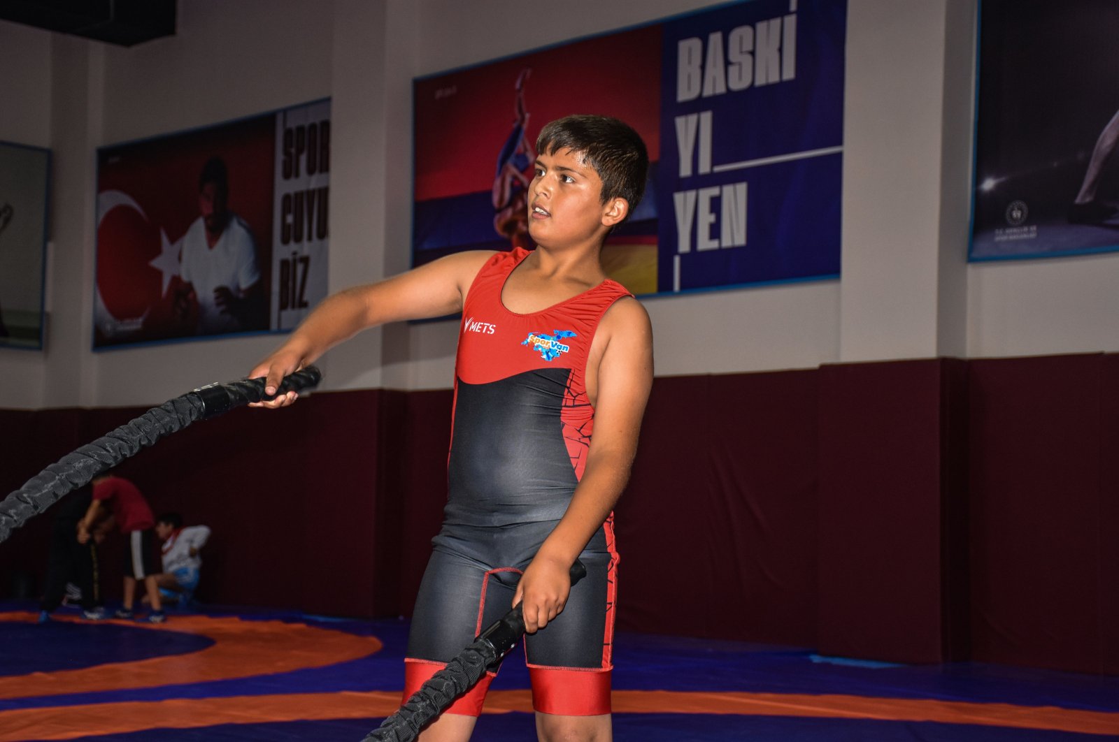 Young Turkish wrestler Botan Demir trains in Van, Türkiye, Aug. 2, 2023. (AA Photo)