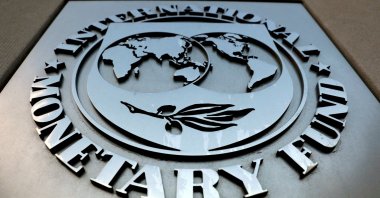 The International Monetary Fund (IMF) logo outside the headquarters building in Washington, U.S., Sept. 4, 2018. (Reuters Photo)