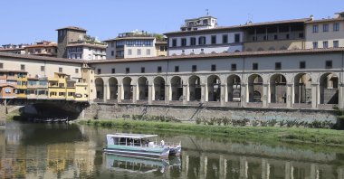Spraypainted graffiti marks seven pilasters of the "Corridoio Vasariano" in Florence, central Italy, Aug. 23, 2023. (AP Photo)
