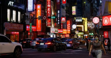 People on a street in Taipei, Taiwan, July 25, 2023. (Reuters Photo)