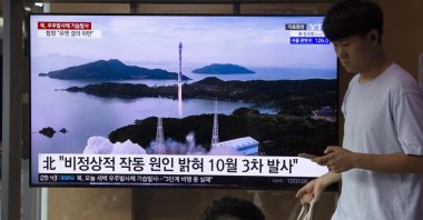 People watch a TV report on North Korea's botched space rocket launch at Seoul Station in Seoul, South Korea, Aug. 24, 2023. (EPA Photo)