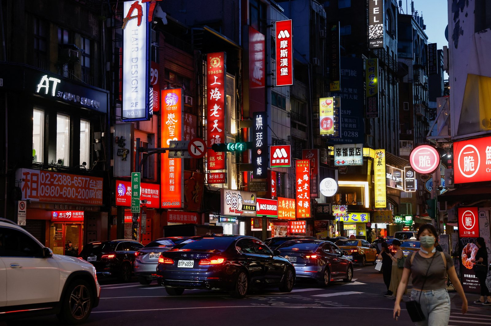 People on a street in Taipei, Taiwan, July 25, 2023. (Reuters Photo)