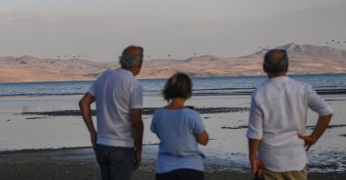 Locals seen amid the shrinking shorelines of Lake Van, Türkiye, Aug. 25, 2023. (Courtesy of @FulyaOzerkan)