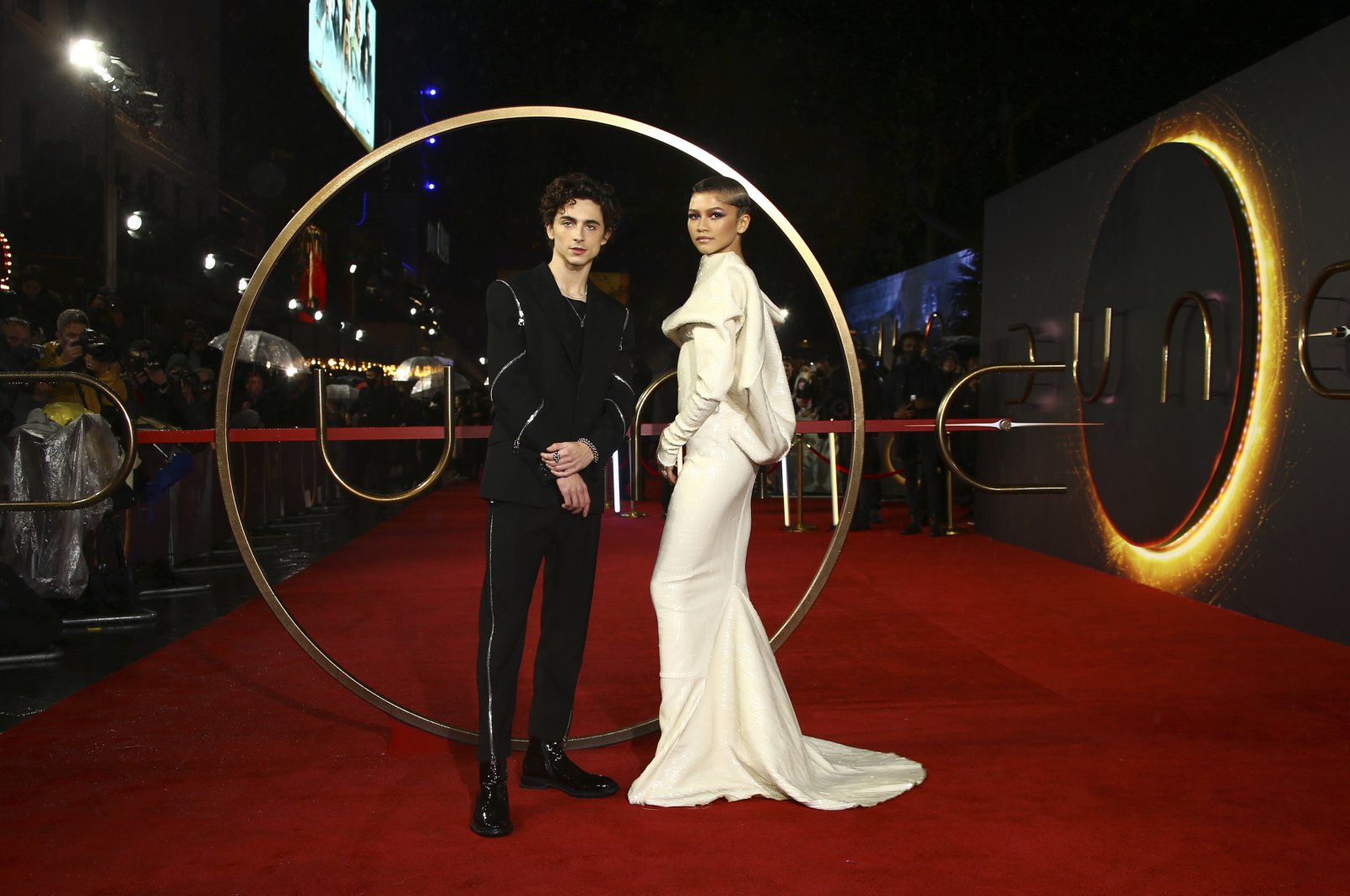 Timothee Chalamet (L) and Zendaya pose for photographers upon arrival at the premiere of the film &quot;Dune,&quot; in London, U.K., Oct. 18, 2021. (AP Photo)