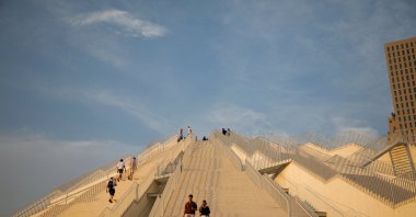 Tourists visit the redesigned pyramid that was formerly a museum for the late Communist dictator Enver Hoxha, Tirana, Albania, Aug. 24, 2023. (Reuters Photo)