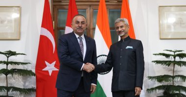 Former Foreign Minister Mevlüt Çavuşoğlu (L) and Indian Foreign Minister Subrahmanyam Jaishankar shake hands after discussions on the sidelines of G-20 foreign ministers&#039; meeting in New Delhi, India, Feb. 28, 2023. (AA Photo)